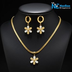 A studio shot of the full Golden Daisy Charm Set displayed together against a black background. The photo shows the gold-plated snake chain necklace with its matching flower pendant and the coordinating pair of hoop earrings with flower charms.