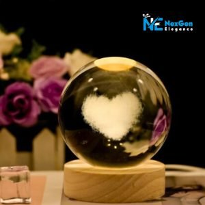 Luminous crystal ball with glowing white heart design on wooden base, romantic LED night lamp.