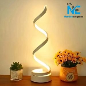 White spiral LED desk lamp on a wooden table beside flowers and a succulent, perfect for home décor