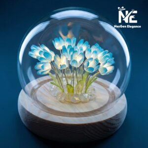 Close-up of blue LED tulip flower lamp with crystal stones and wooden base.
