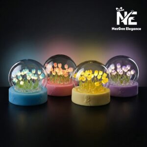 Four NexGen Elegance Tulip Glow Lamps lined up in blue, pink, yellow, and purple colors, glowing softly against a dark background.